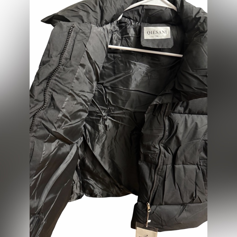 Women’s black puffer vest by Qiesani! New with tags! Has 2 pockets on each side! - Picture 4 of 6
